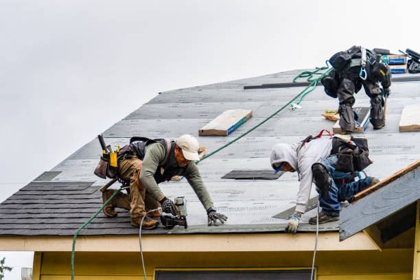 Professional Roofing technician working in Port Jefferson Station, NY